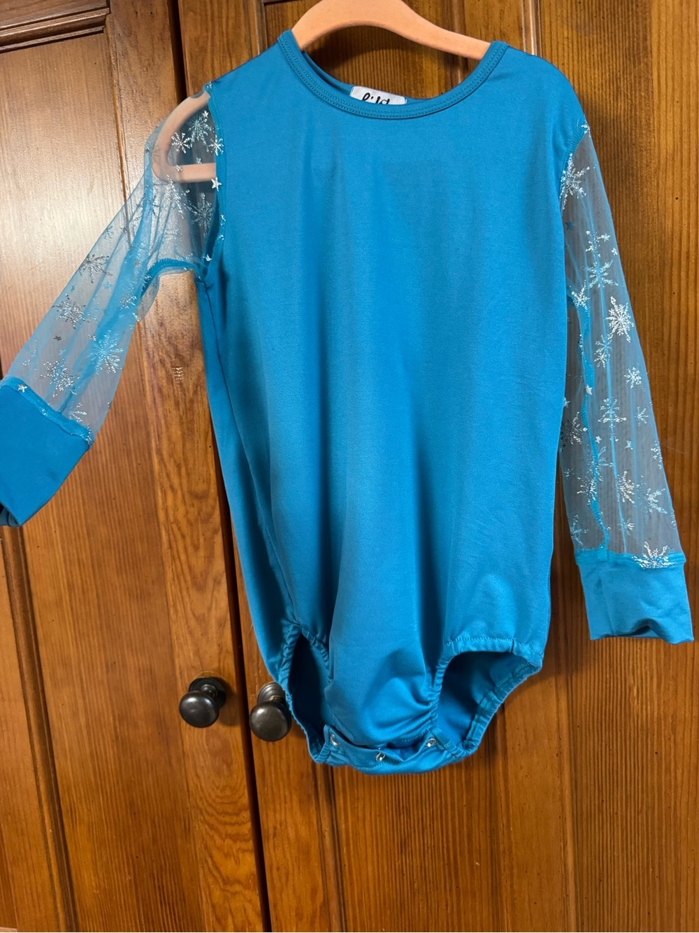 Blue Lilly in the Alley Mesh Sleeve Onesie
